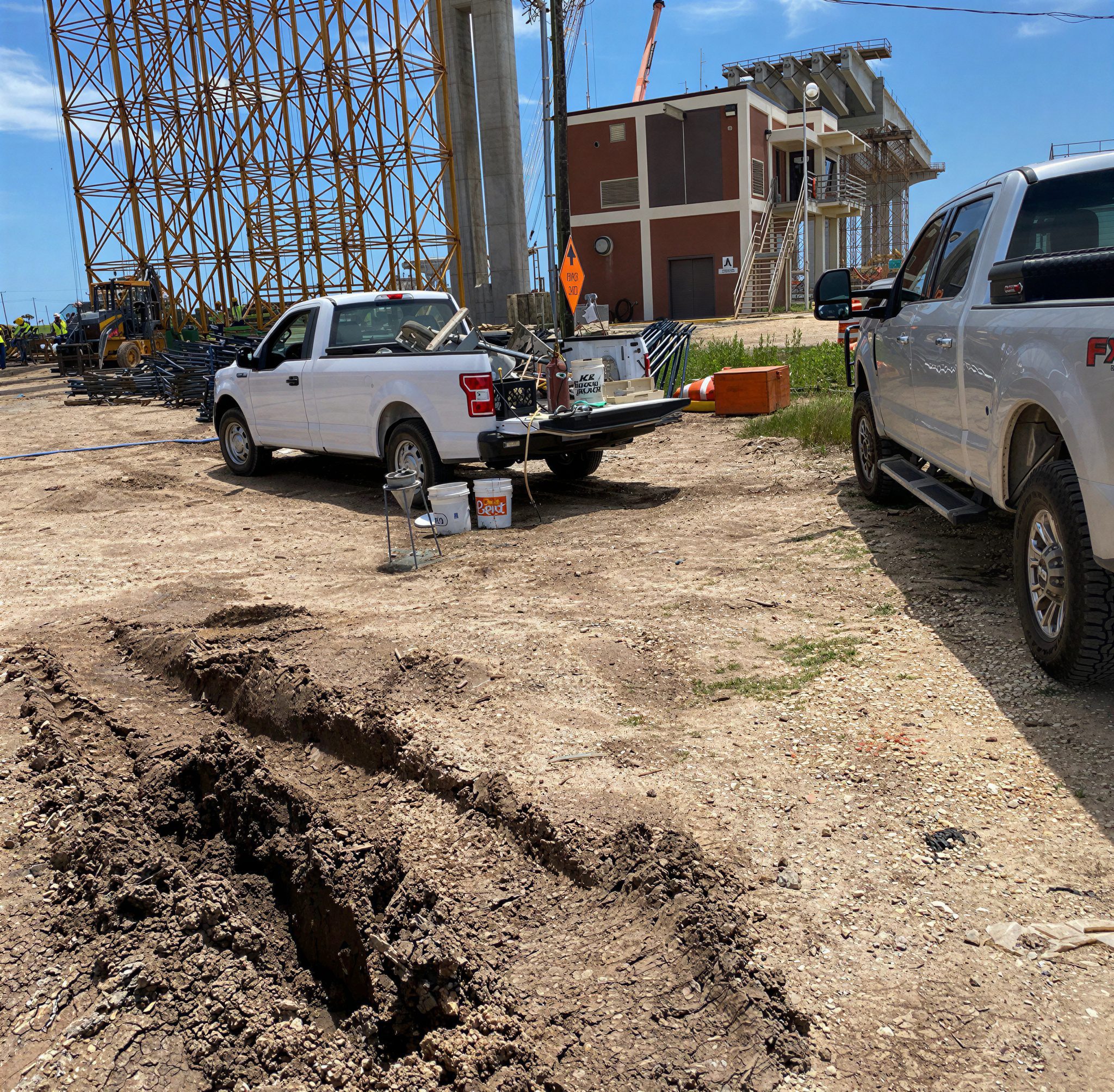 Vehicles near industrial structure